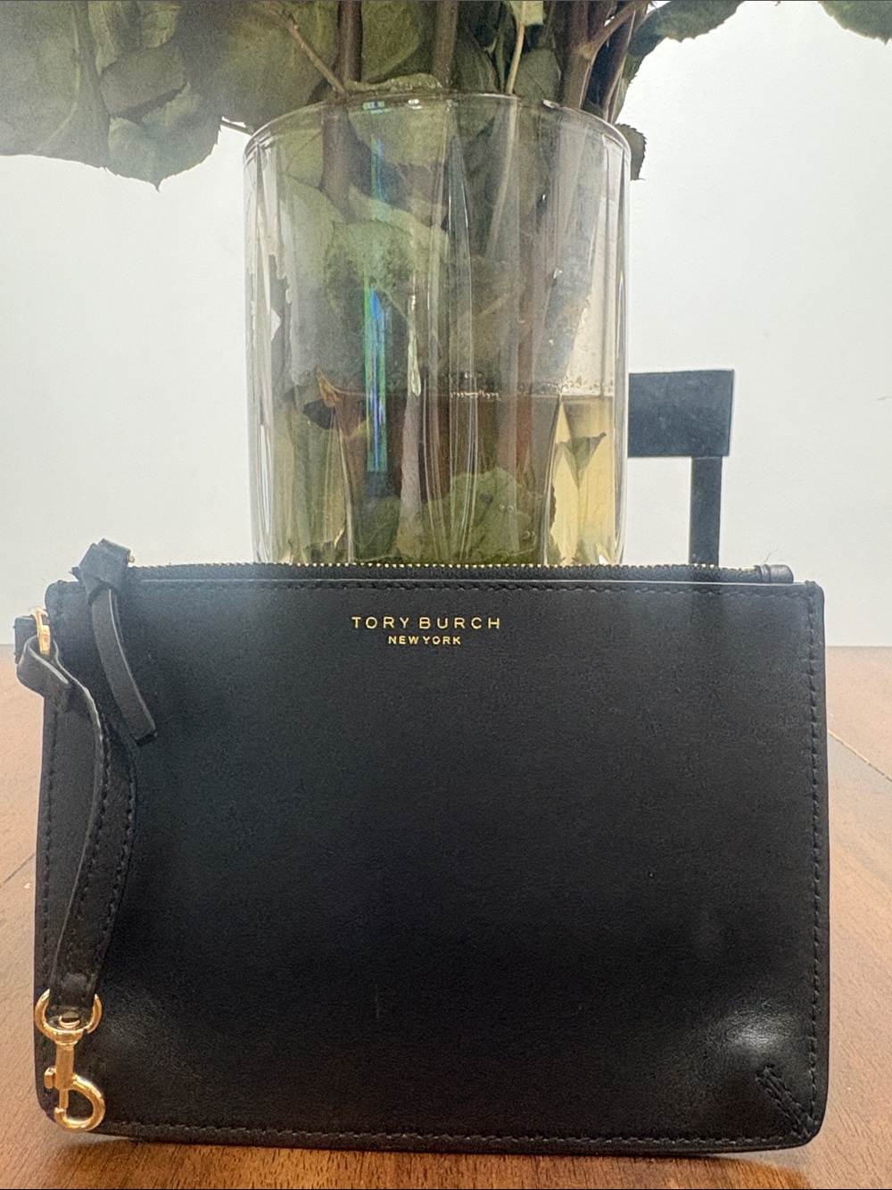 Tory Burch Black Leather Wristlet with Gold Logo. Like new no callouts